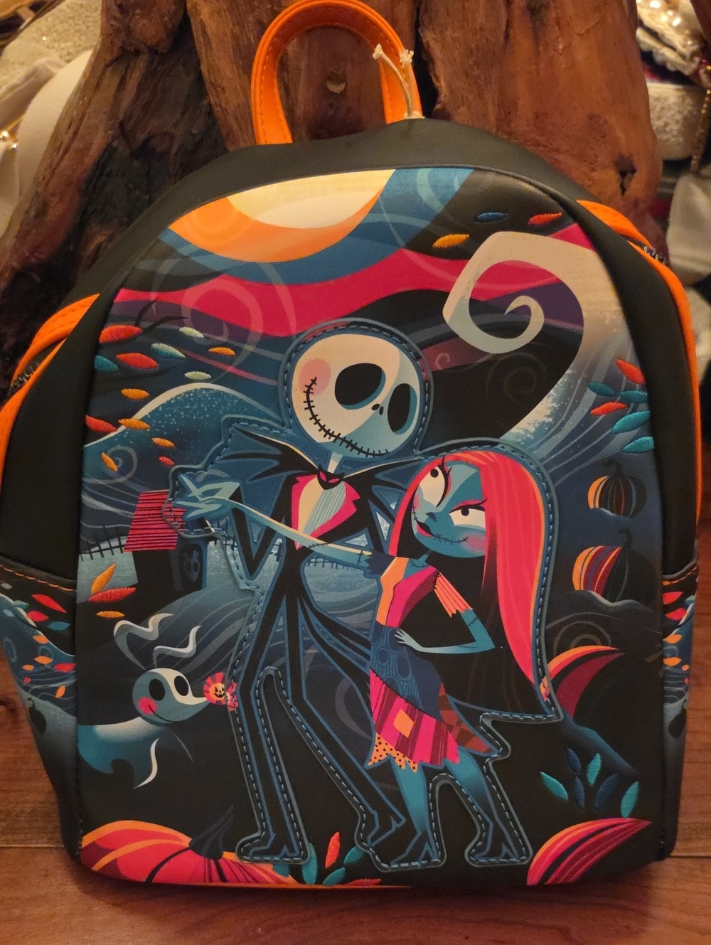 Loungefly Black Backpack with Pink, Orange & Blue Nightmare Scene